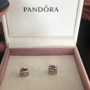 Two Pandora sterling silver purse charms